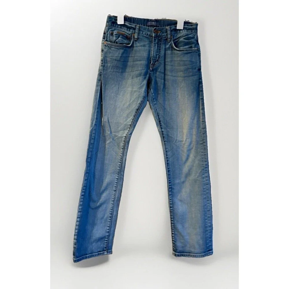 Jacob Davis medium-wash denim jeans featuring a distinct copper-toned 30x34